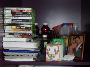 XBox games, books on EVERYTHING, the cute box that Butch's kids made for Kev (and donated their piggy bank to-so awesome!), our wedding picture..and behind lies the greatness.  Turkey Hill Tea and Juicy Juice Berry.  However, Kevin is losing his taste for JJ Berry due to the chemo ulcers-Hopefully it comes back because I've got 7 bottles of JJBerry in my trunk!