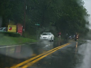 Good Samaritans clearing the road of Hanna debris