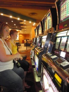 Joni and I playing the slots, not much luck there